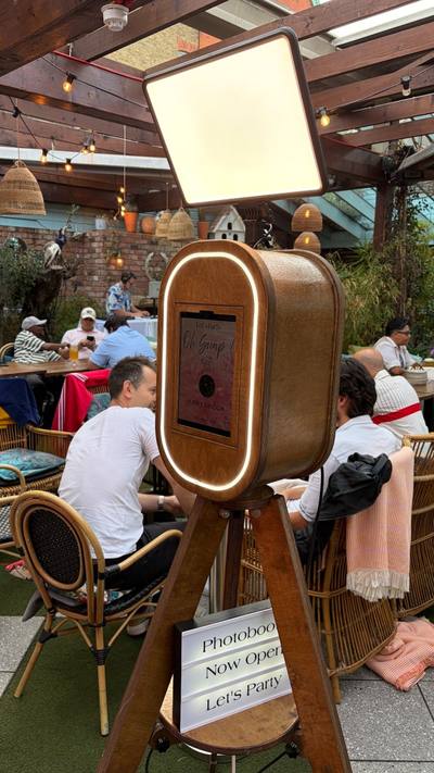Digital photo booth with props and backdrop