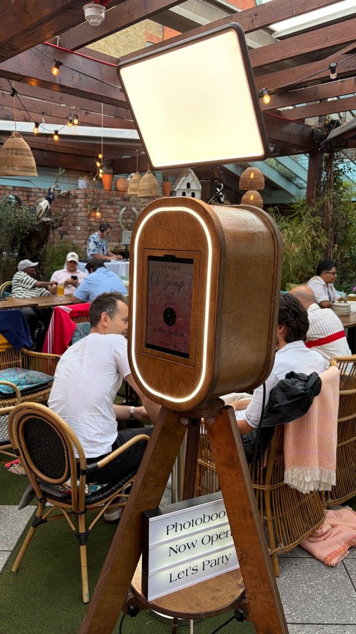 Digital photo booth with props and backdrop