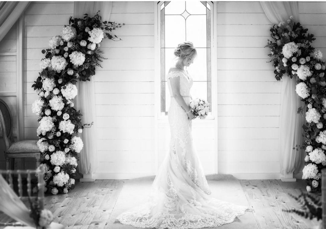 Church aisle floral decorations with pew ends