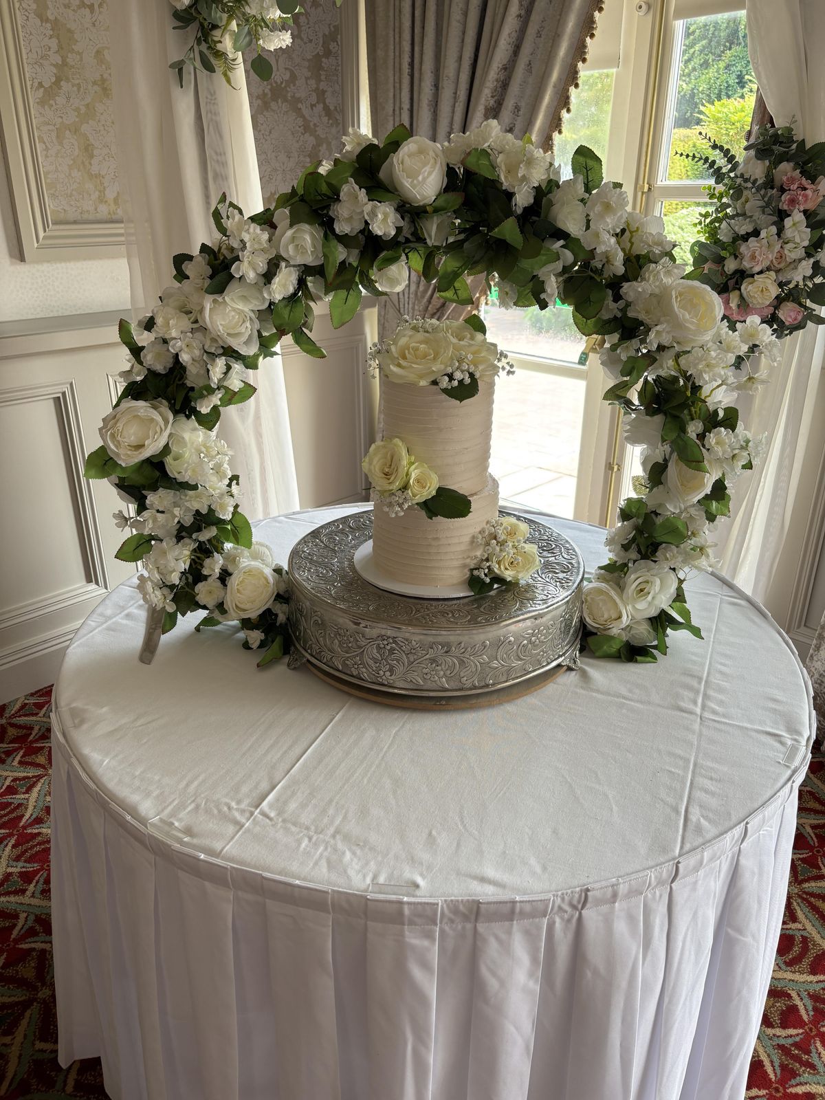 Flower decorated cake stand display