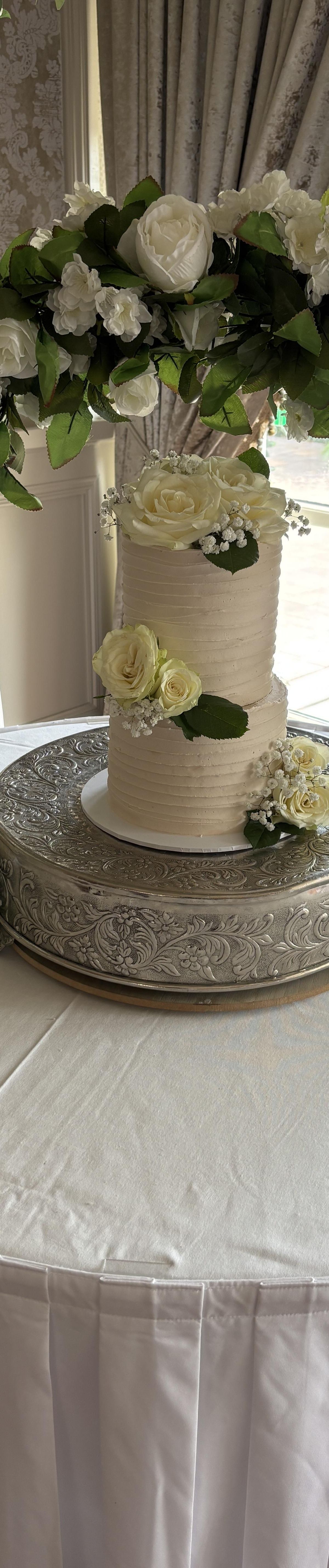 Flower decorated cake stand display