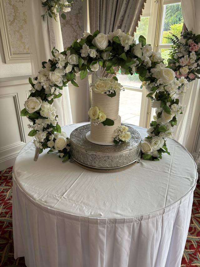 Flower decorated cake stand display