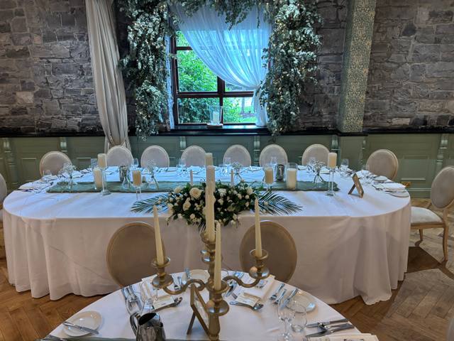 Top table arrangement with cascading flowers