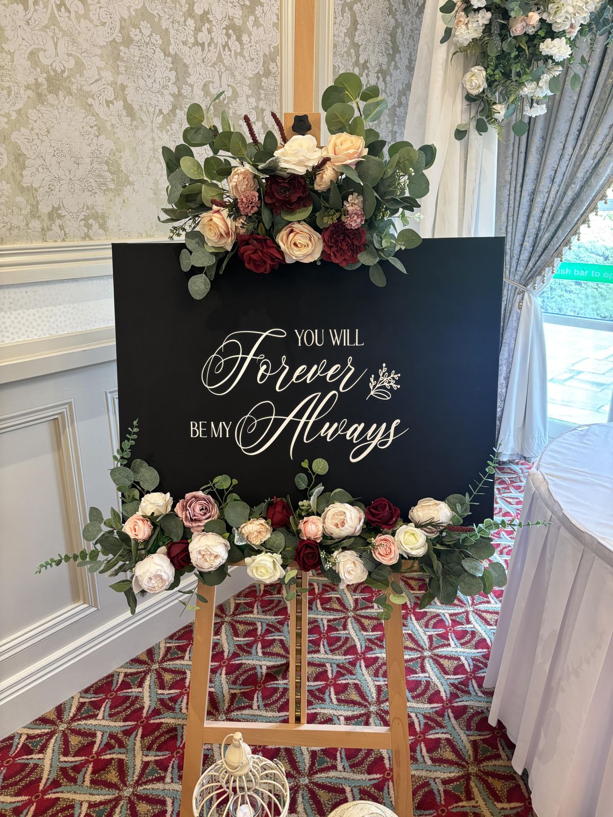 Rustic barrel and flower arrangement