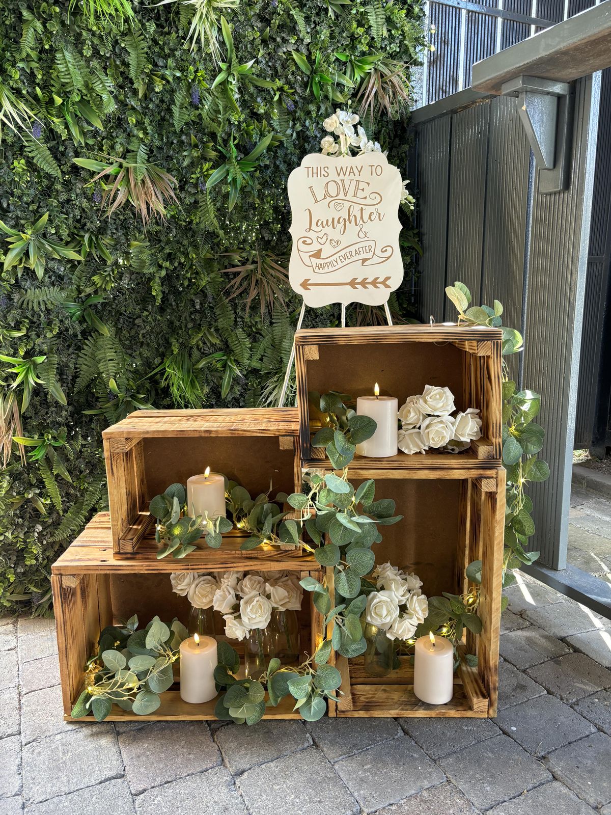 Rustic crates with flowers reception decor